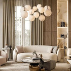 Casen Modern Round Chandelier - Hand-Blown Crackle Glass & Satin Brass LED Pendant Light in brass by Blush Lighting