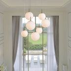 Casen Modern Round Chandelier - Hand-Blown Crackle Glass & Satin Brass LED Pendant Light in brass - dining room lighting
