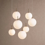 Casen Modern Round Chandelier - Hand-Blown Crackle Glass & Satin Brass LED Pendant Light - 7-Light 34''Matte Opal - VChandelier