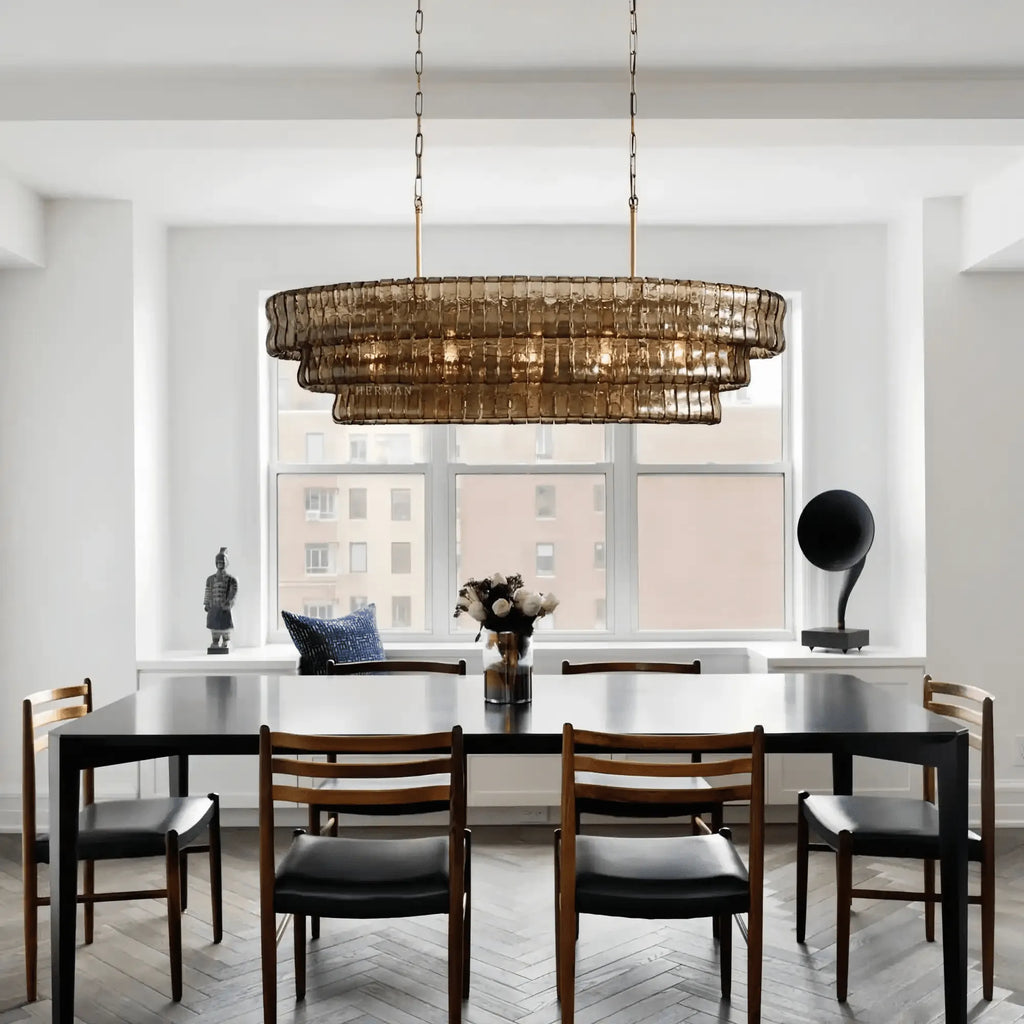 Ghiaccio Glass Oval Chandelier 54''65'' styled in a modern dining room