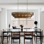 Ghiaccio Glass Oval Chandelier 54''65'' styled in a modern dining room